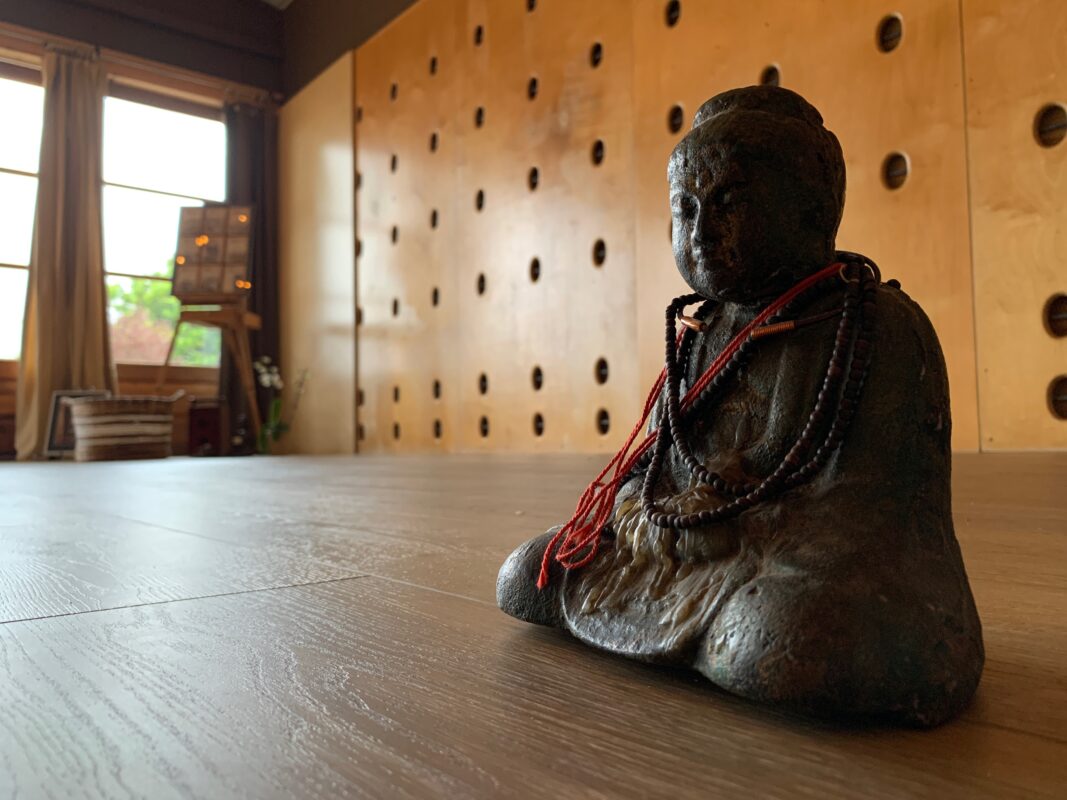 Meditation Buddha statue in the private Yoga Mandiram studio.