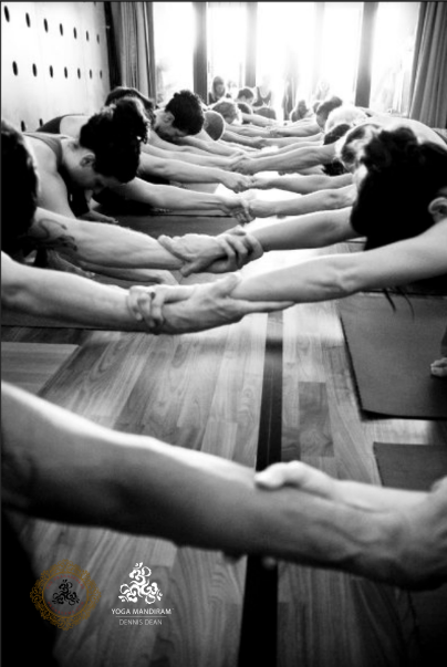 Students practicing yoga together in a private studio at Yoga Mandiram.