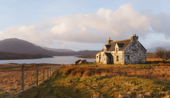 Stone cottage beneath autumn clouds on the Isle of Lewis, Scotland